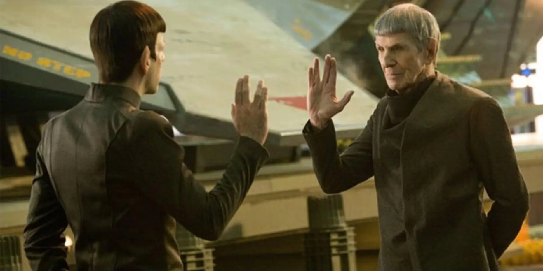 Spock old and new versions meeting each other with the Vulcan salute